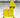 Yellow double mop bucket on concrete floor.